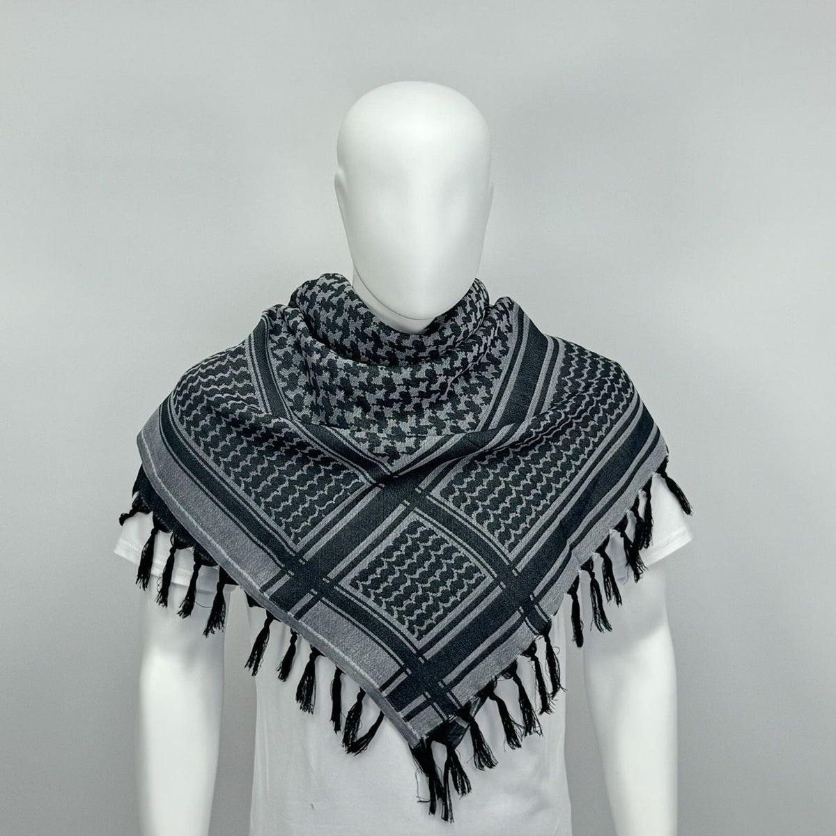 Gråt og blåt palæstinensisk kufiya keffiyeh-tørklæde.