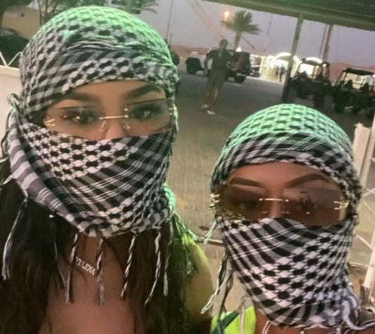 black white kufiya worn as face cover
