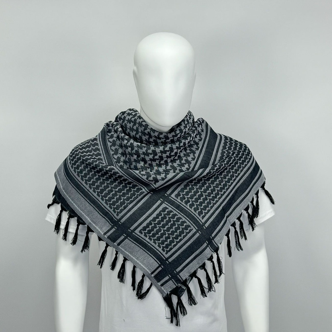 Gråt og blåt palæstinensisk kufiya keffiyeh-tørklæde.