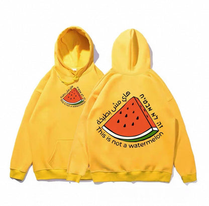 Gul hoodie med stor vandmelon og teksten “This is not a watermelon”