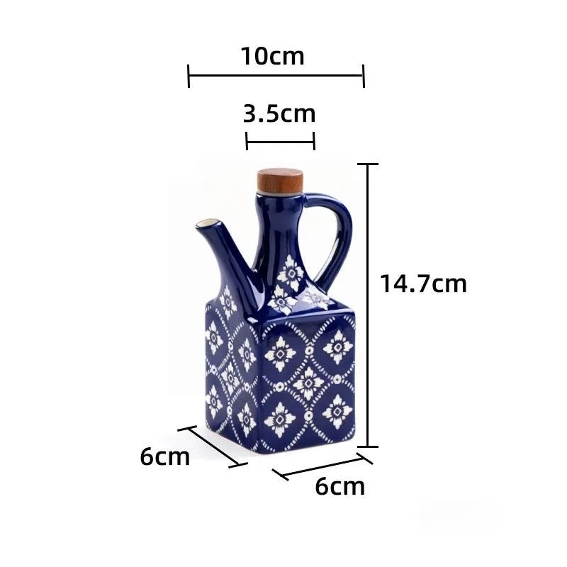 Lille blå keramisk olivenolieflaske med mål