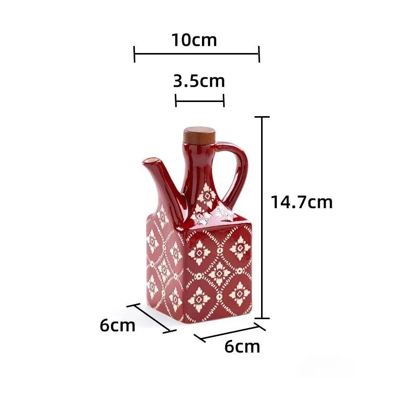 Lille rød keramisk olivenolieflaske med mål