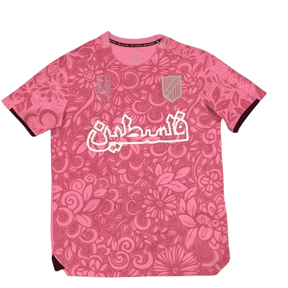 Lyserød FC Palestine football jersey med floral print og hvid arabisk Palestine tekst