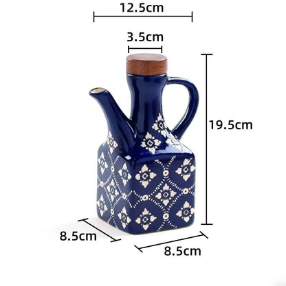 Stor blå keramisk olivenolieflaske med mål