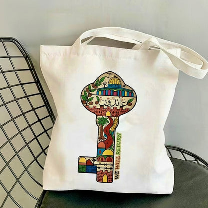 Palæstinensisk mulepose båret i hånden.