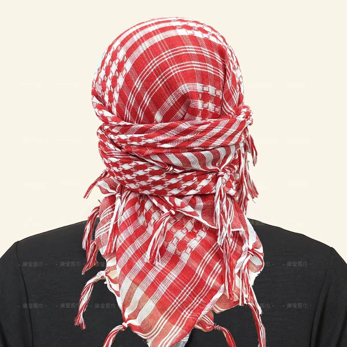 red kufiya wrapped around head